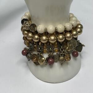 set of beaded bracelets natural neutral beads costume jewelry as shown
